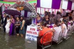 Người ta đám cưới linh đình, tôi đây mưa ngập nhưng mà vẫn vui