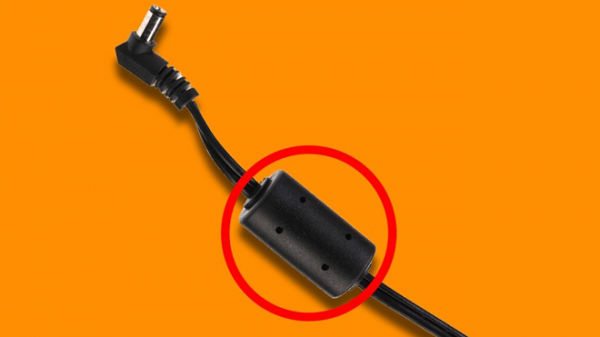 Bạn có biết “cục” hình trụ màu đen ở sạc laptop có vai trò gì không?